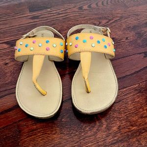 These are kids size 4 tan sandals. They are very comfortable; in good condition!